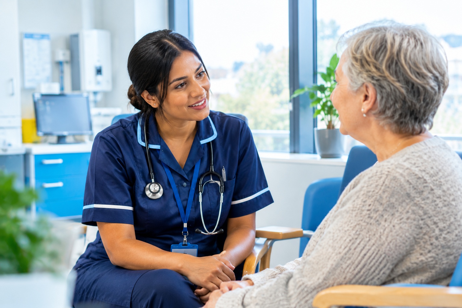 Healthcare professional speaking with a patient